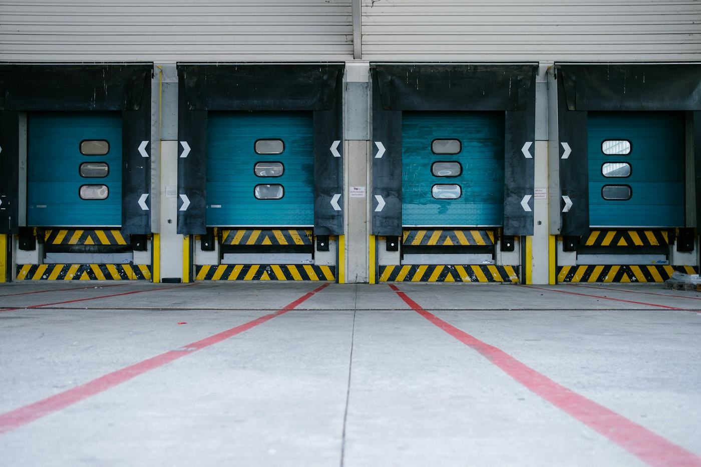 Row of loading dock doors at a distribution facility