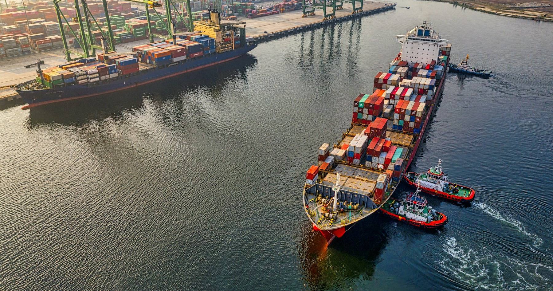 Container vessel under tow in a shipping channel